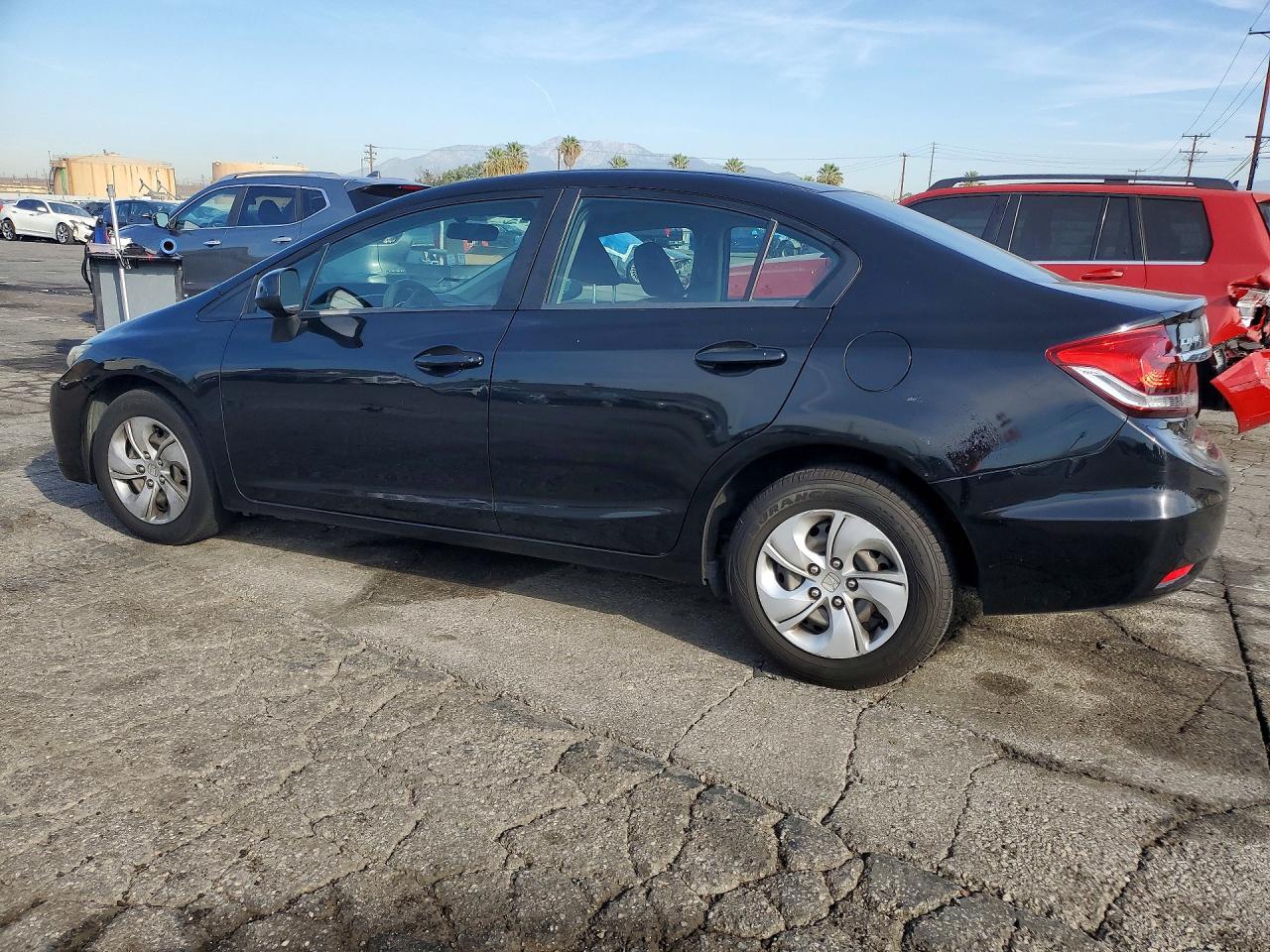 19XFB2F5XFE707514 · 2015 HONDA CIVIC · 2/12