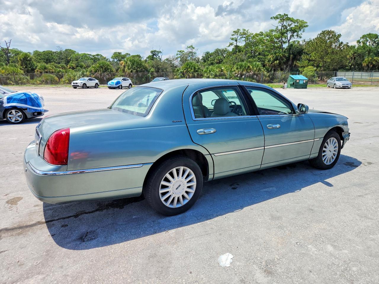1LNHM81W65Y611468 · 2005 LINCOLN TOWN CAR · 3/13