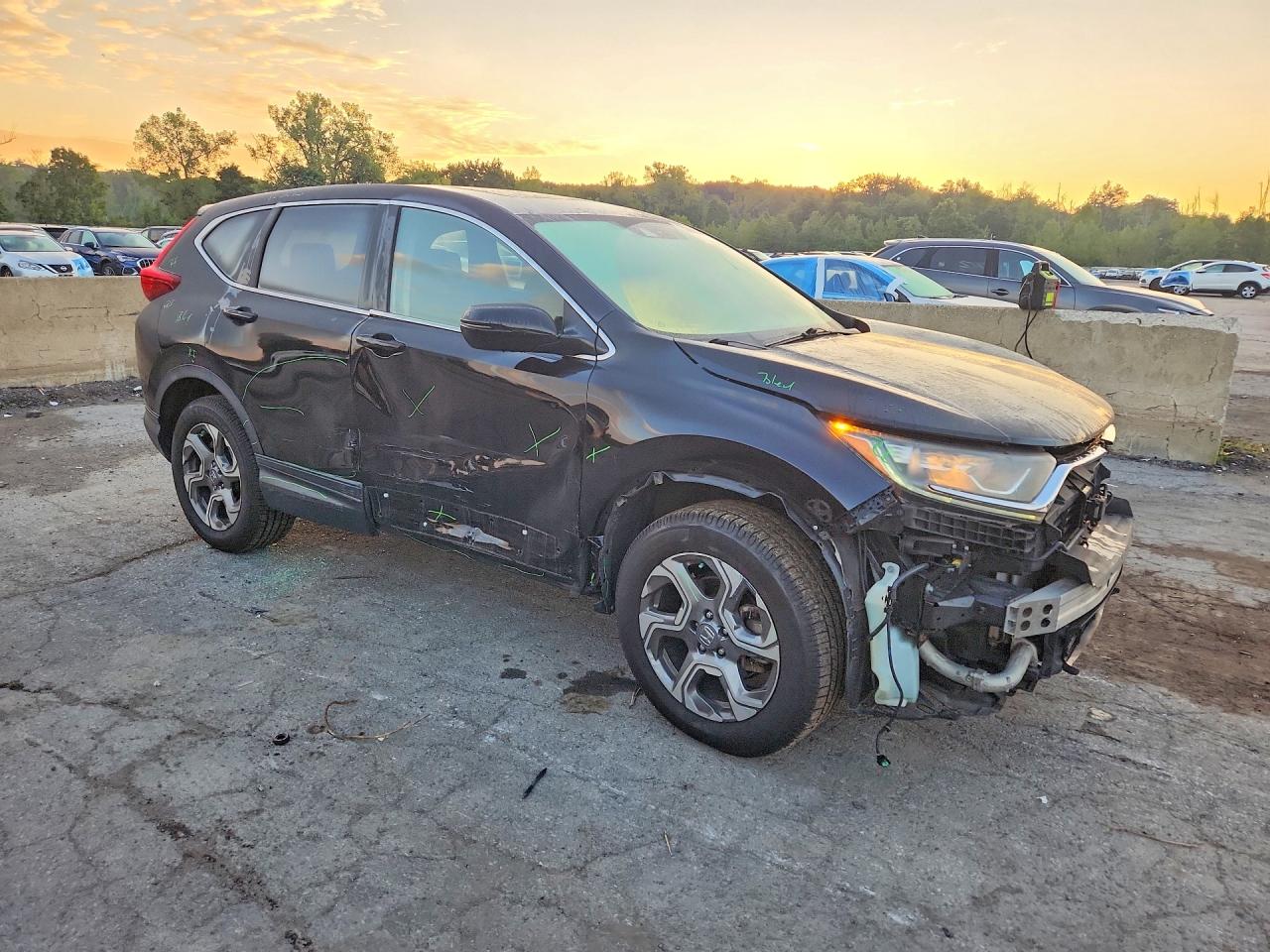 2HKRW2H54HH688424 · 2017 HONDA CR-V · 4/13