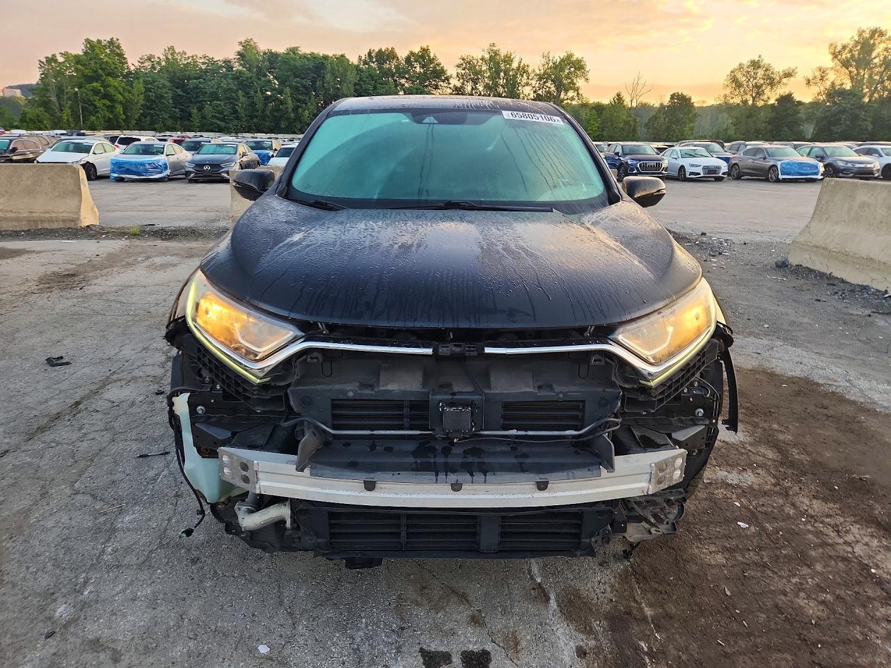 2HKRW2H54HH688424 · 2017 HONDA CR-V · 5/13