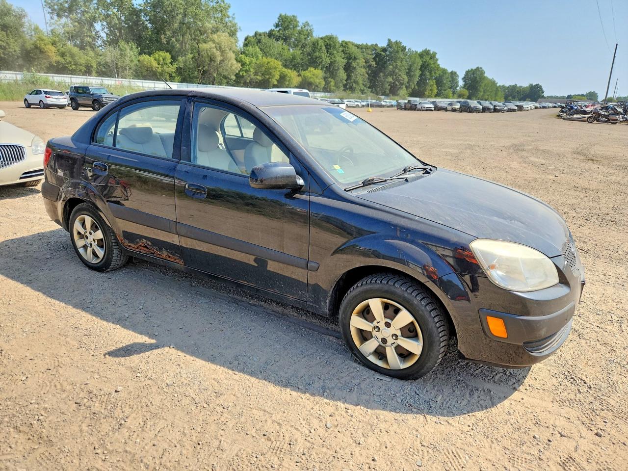KNADE123276209387 · 2007 KIA RIO · 4/12