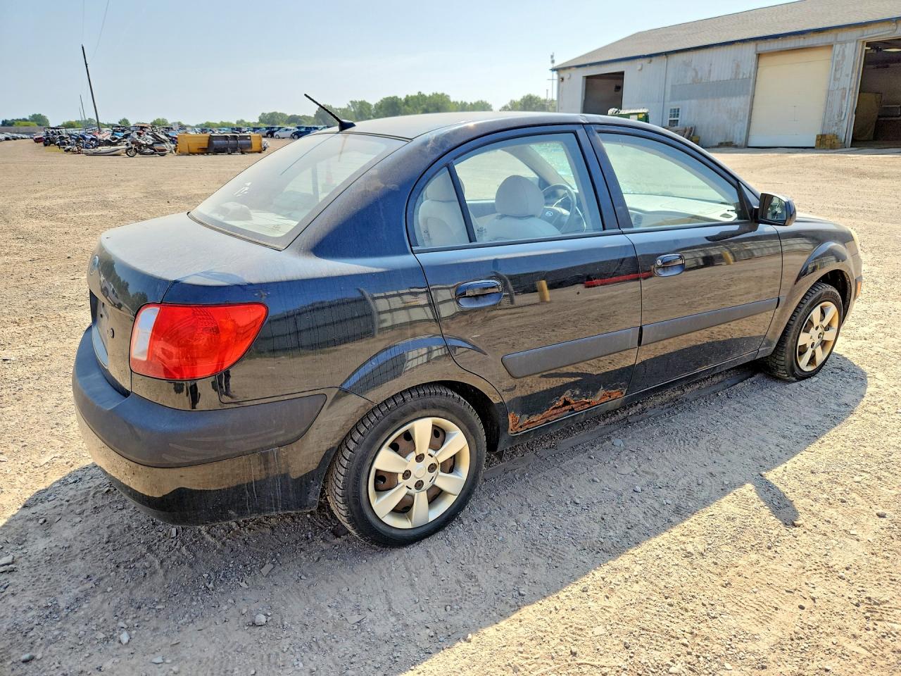 KNADE123276209387 · 2007 KIA RIO · 3/12