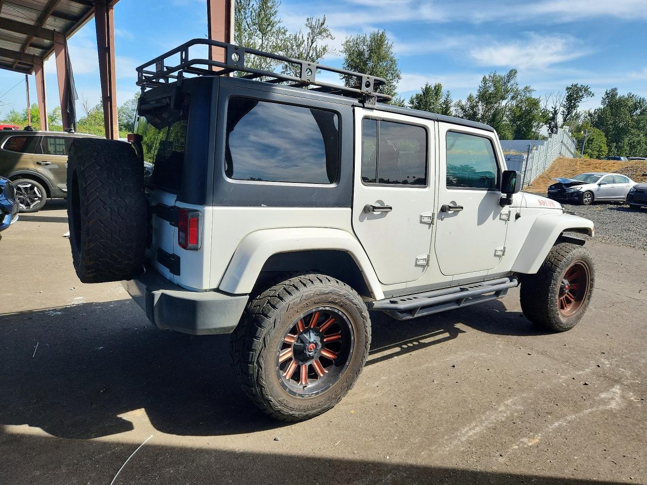 1C4HJWEG5HL714385 · 2017 JEEP WRANGLER UNLIMITED · 3/12