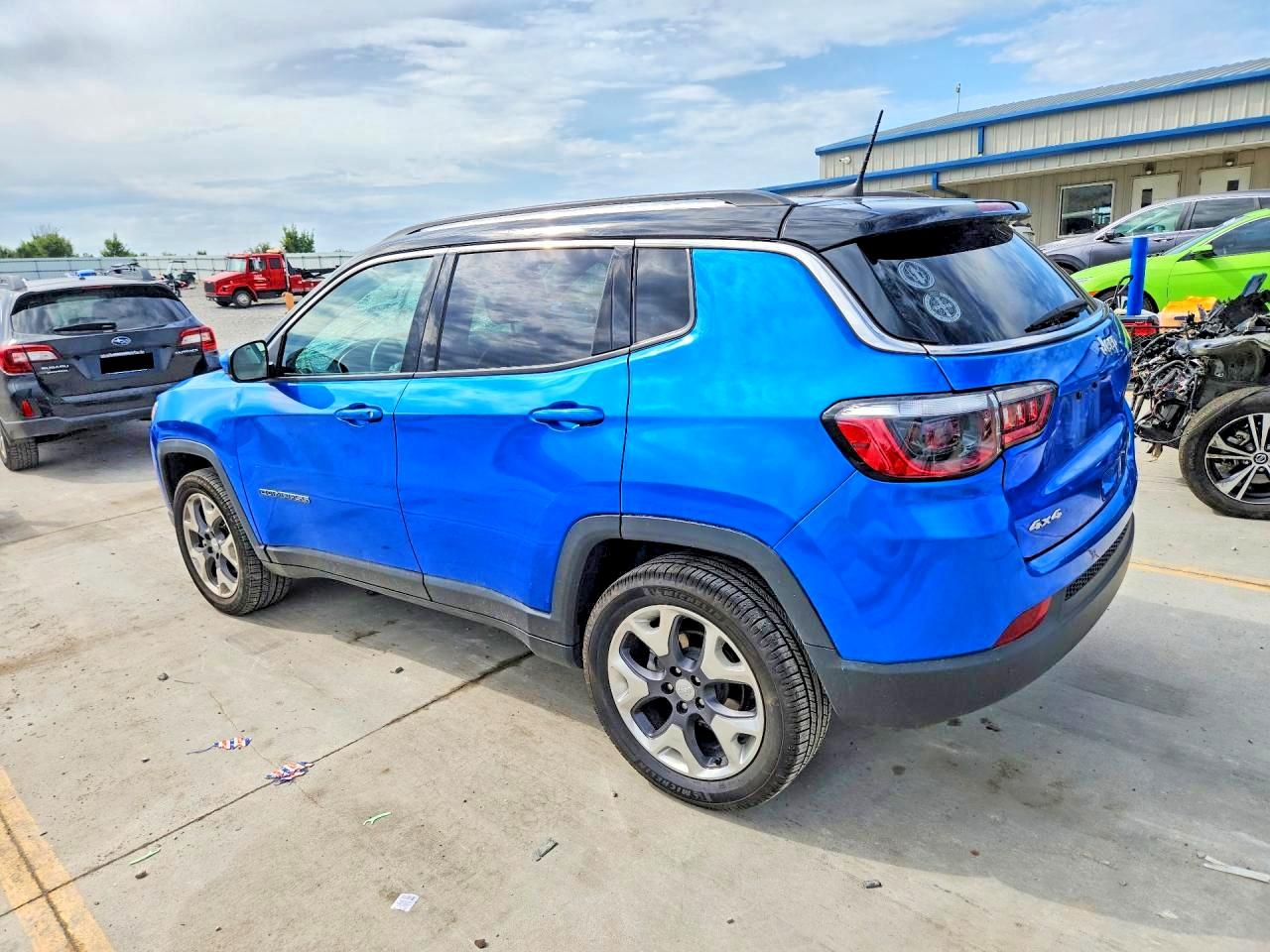 3C4NJDCB5MT596058 · 2021 JEEP COMPASS · 2/13