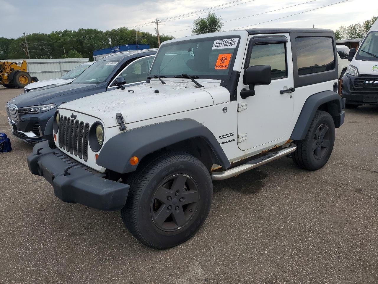 1J4AA2D10BL636915 · 2011 JEEP WRANGLER
