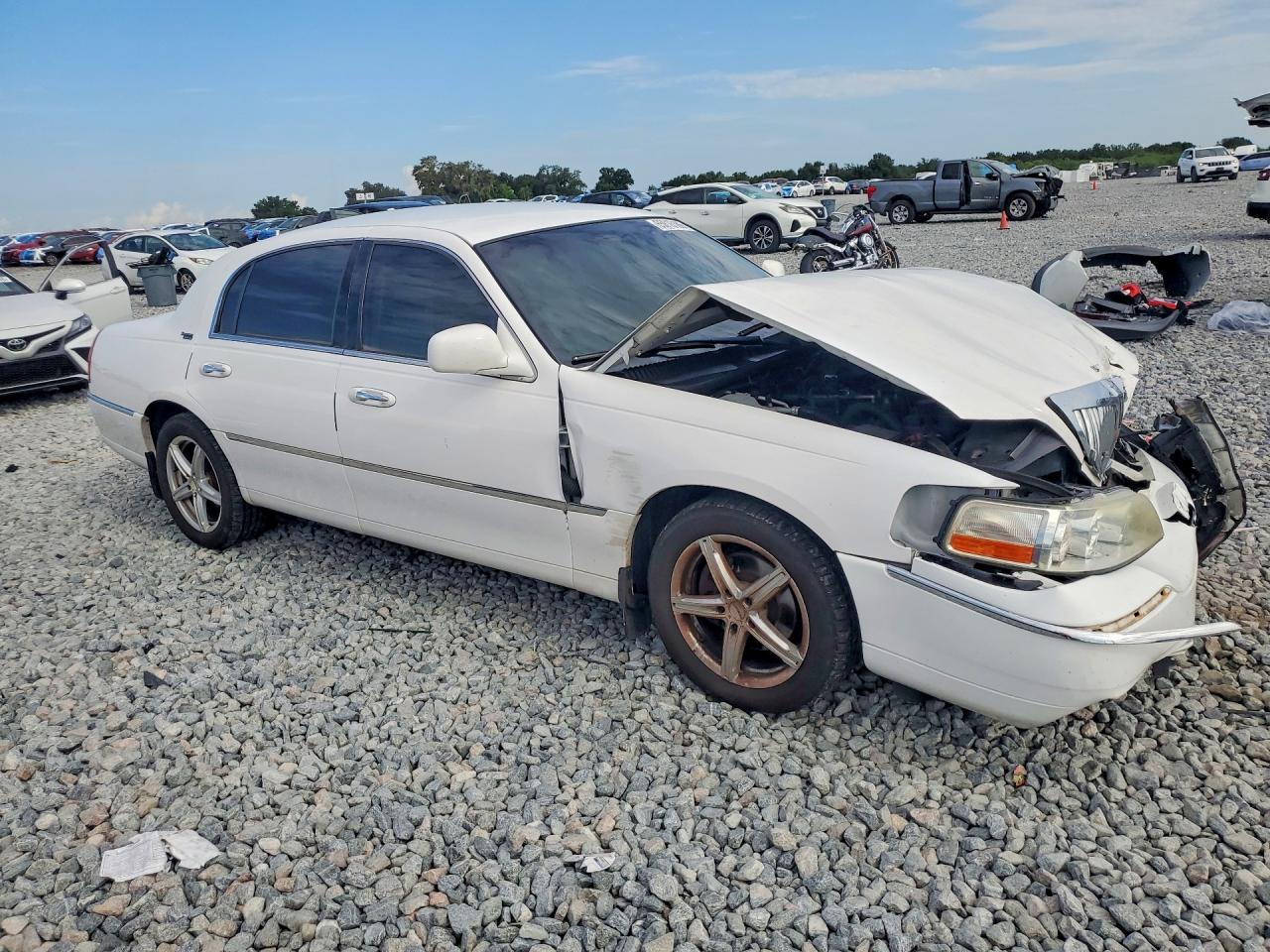 2LNHM82V99X621357 · 2009 LINCOLN TOWN CAR · 4/12