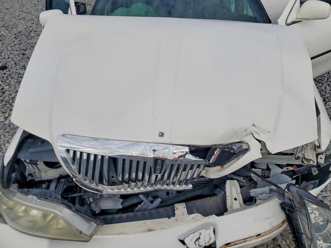 2LNHM82V99X621357 · 2009 LINCOLN TOWN CAR · 11/12