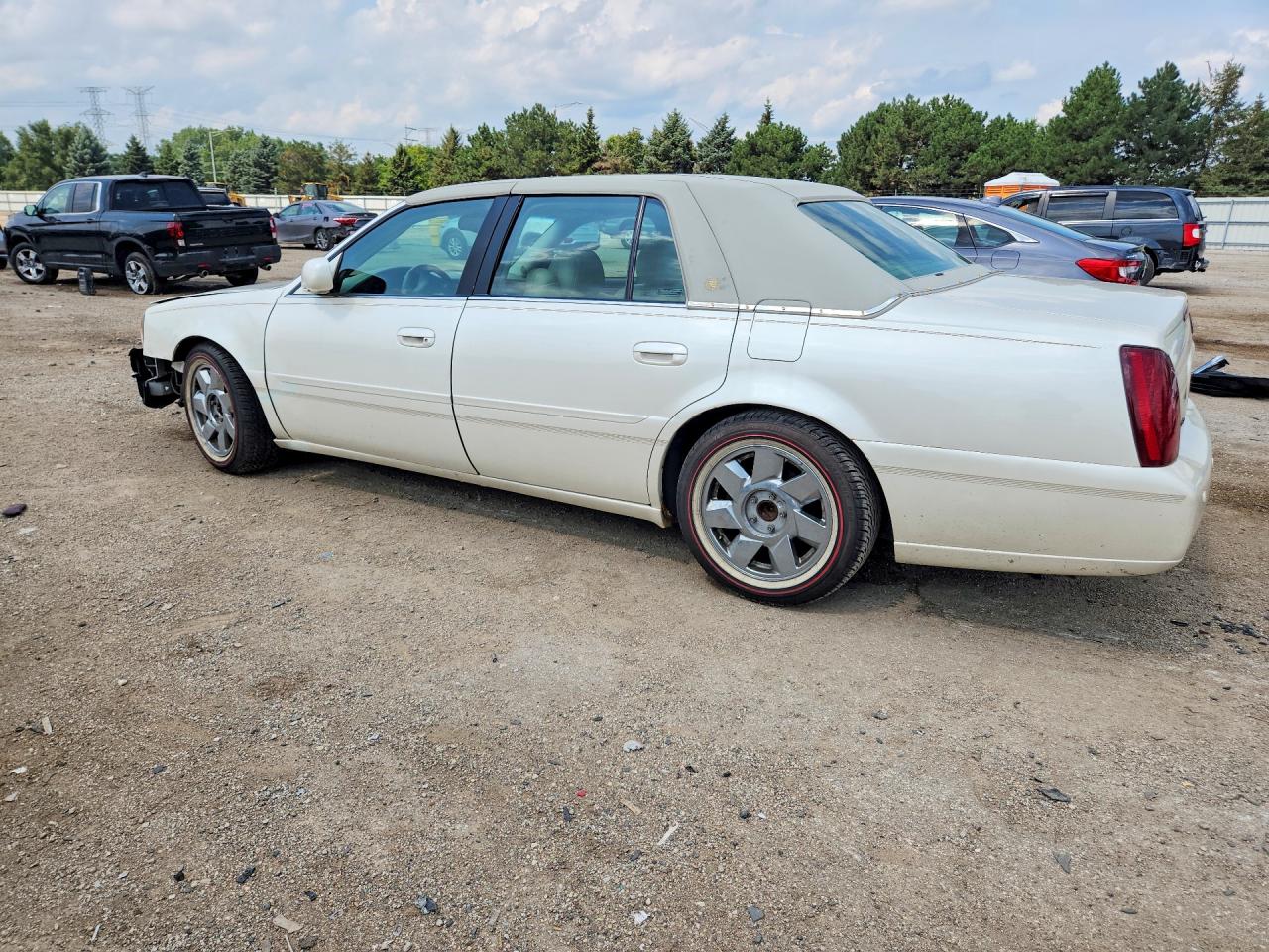 1G6KF5799YU197394 · 2000 CADILLAC DEVILLE · 2/12