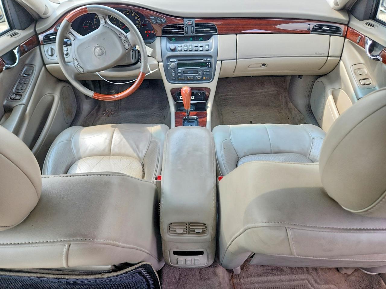 1G6KF5799YU197394 · 2000 CADILLAC DEVILLE · 8/12