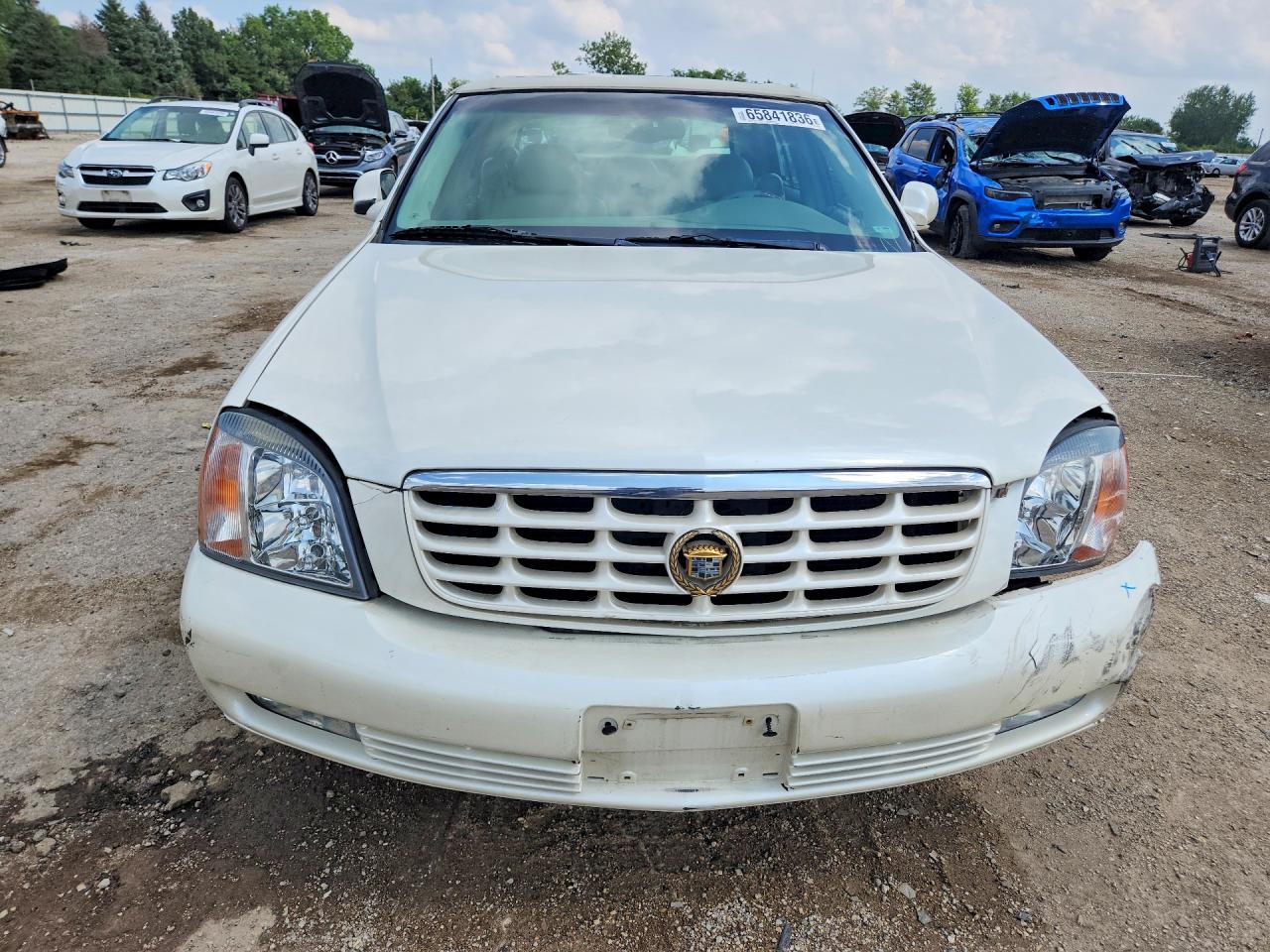 1G6KF5799YU197394 · 2000 CADILLAC DEVILLE · 5/12