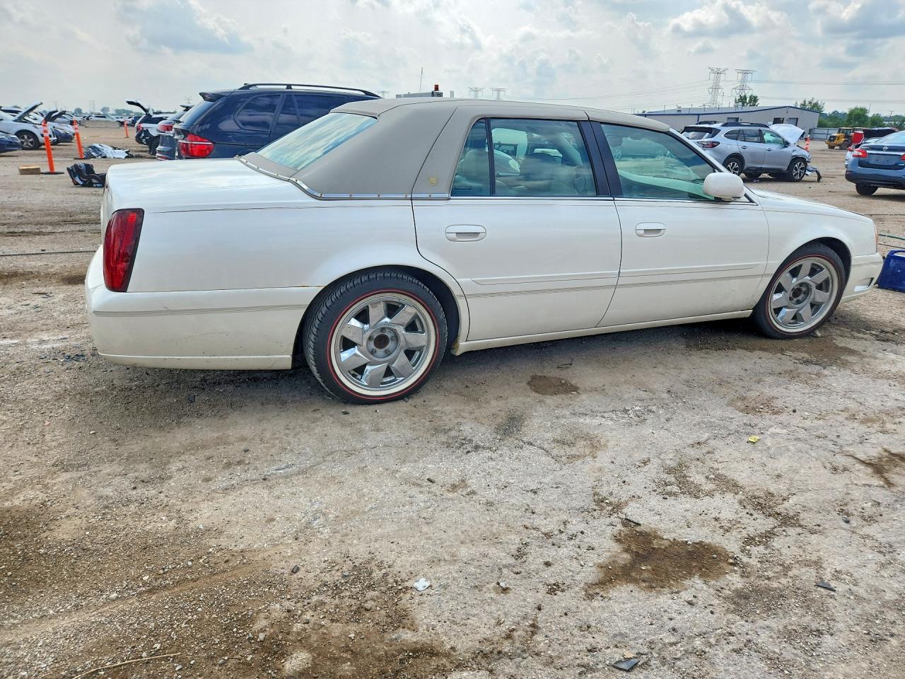 1G6KF5799YU197394 · 2000 CADILLAC DEVILLE · 3/12