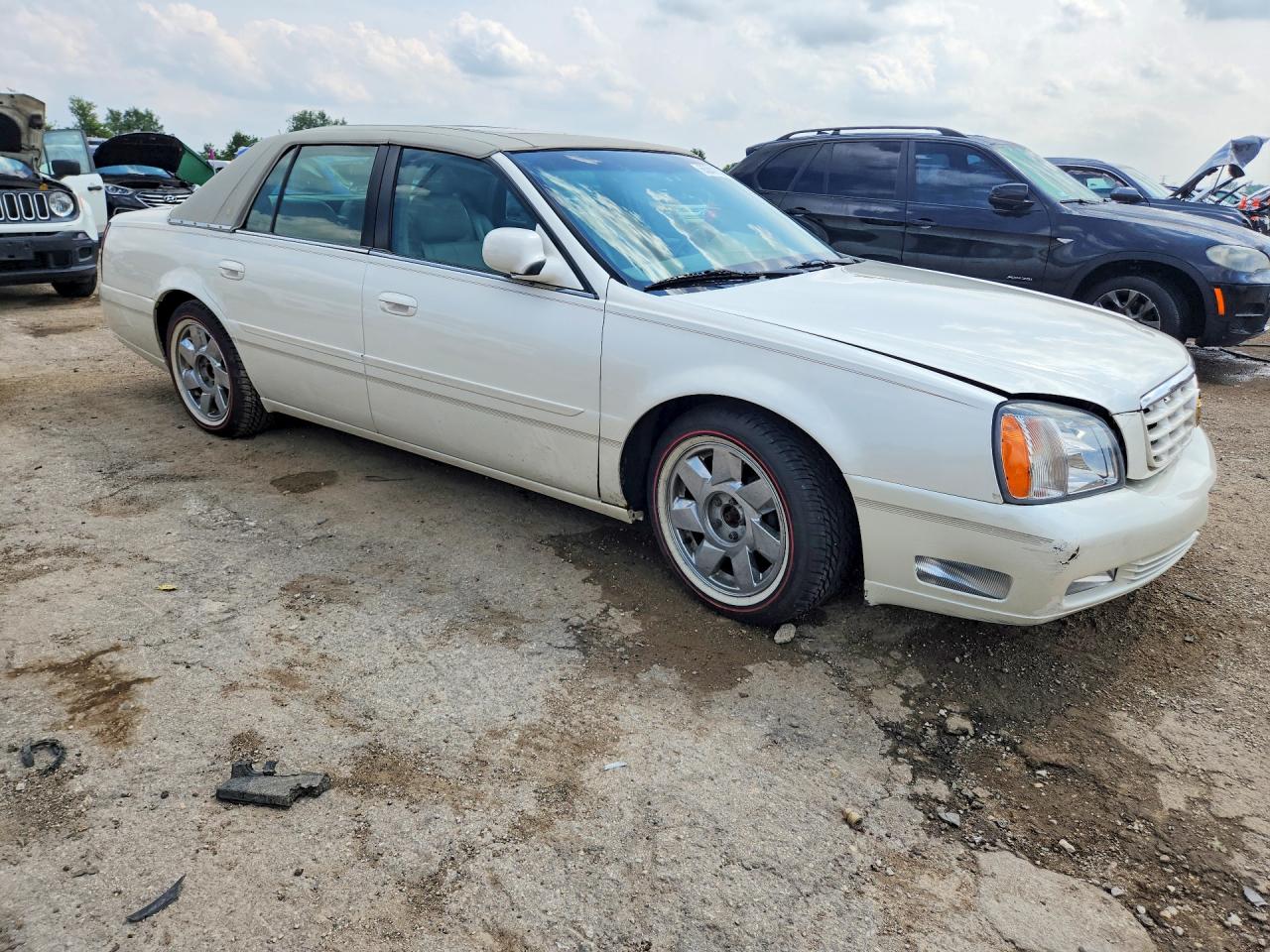 1G6KF5799YU197394 · 2000 CADILLAC DEVILLE · 4/12