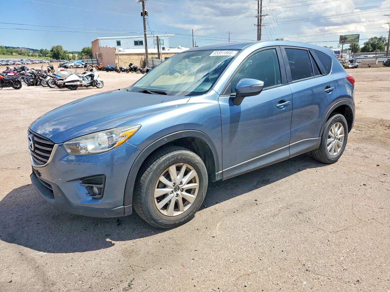 JM3KE4CYXG0623887 · 2016 MAZDA CX-5