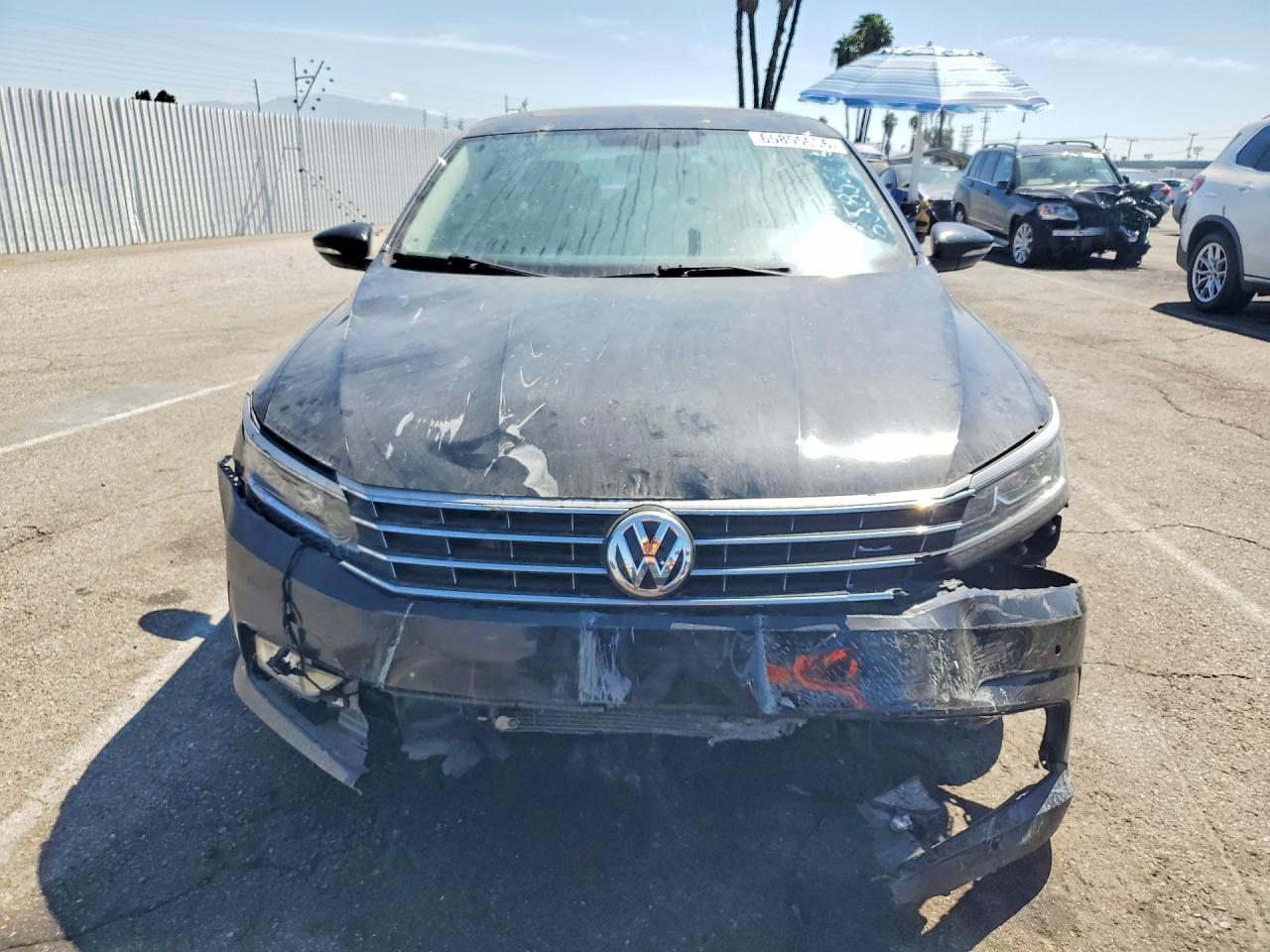 1VWHM7A34HC064395 · 2017 VOLKSWAGEN PASSAT · 5/13