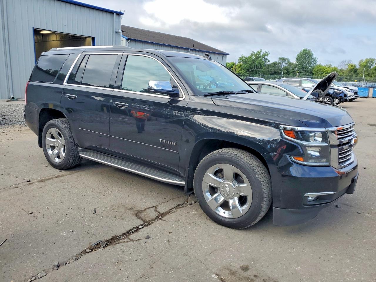 1GNSKCKC0FR686189 · 2015 CHEVROLET TAHOE · 4/13