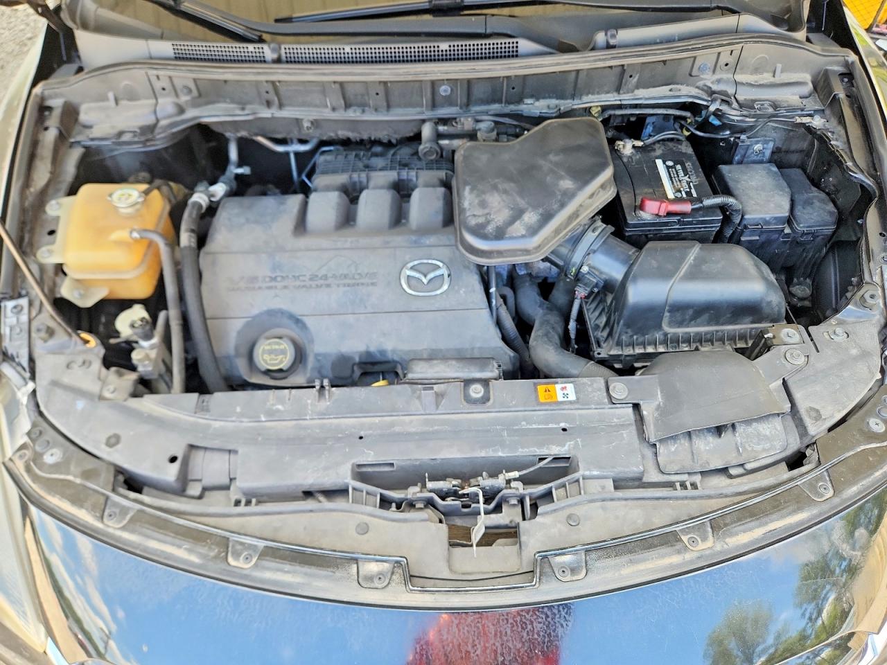 JM3TB2CAXD0424497 · 2013 MAZDA CX-9 · 12/14