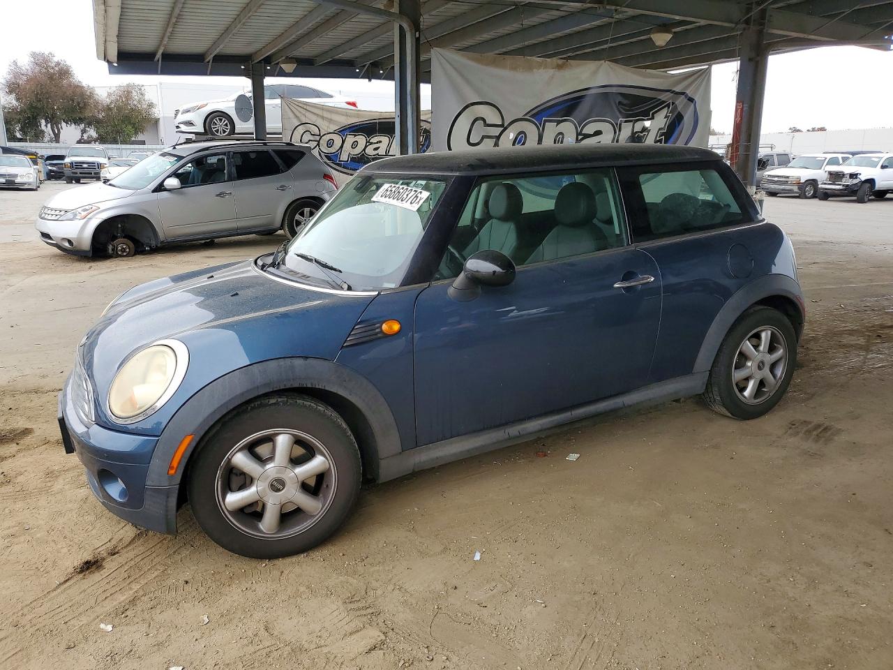WMWMF33539TU75417 · 2009 MINI COOPER