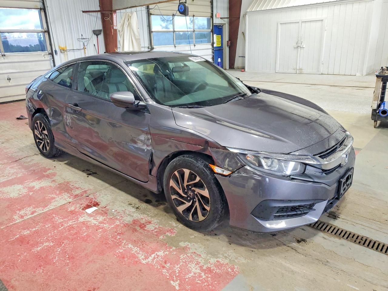 2HGFC4B08GH310961 · 2016 HONDA CIVIC · 4/13