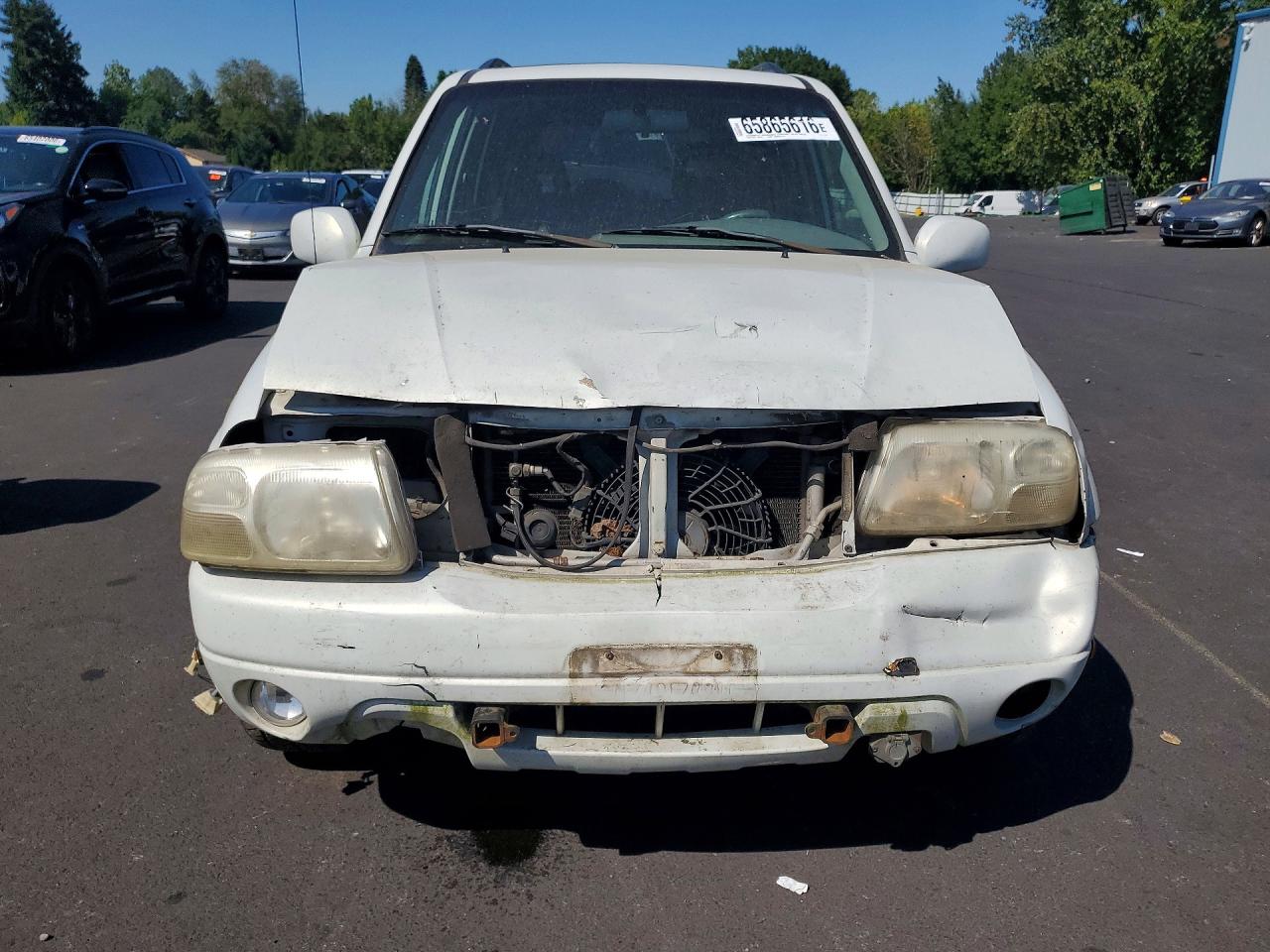 JS3TX92V124128119 · 2002 SUZUKI XL7 · 5/12