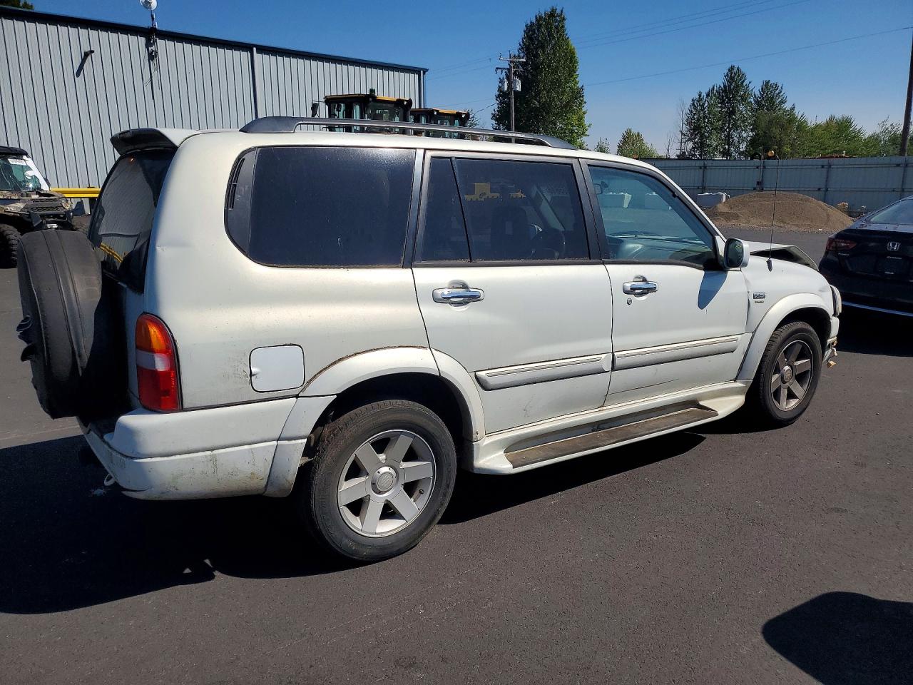 JS3TX92V124128119 · 2002 SUZUKI XL7 · 3/12