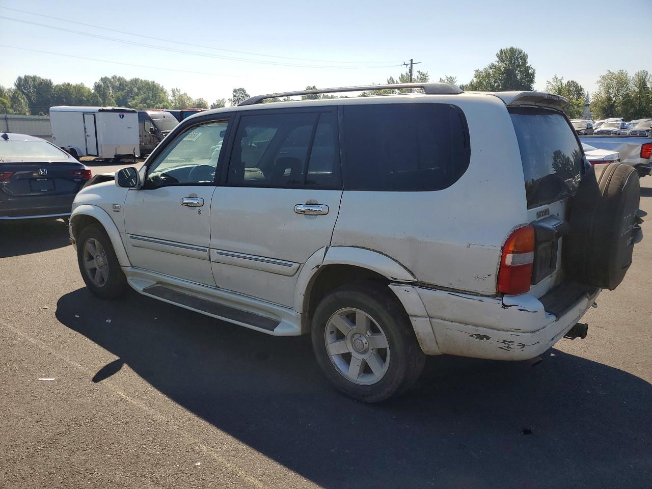 JS3TX92V124128119 · 2002 SUZUKI XL7 · 2/12
