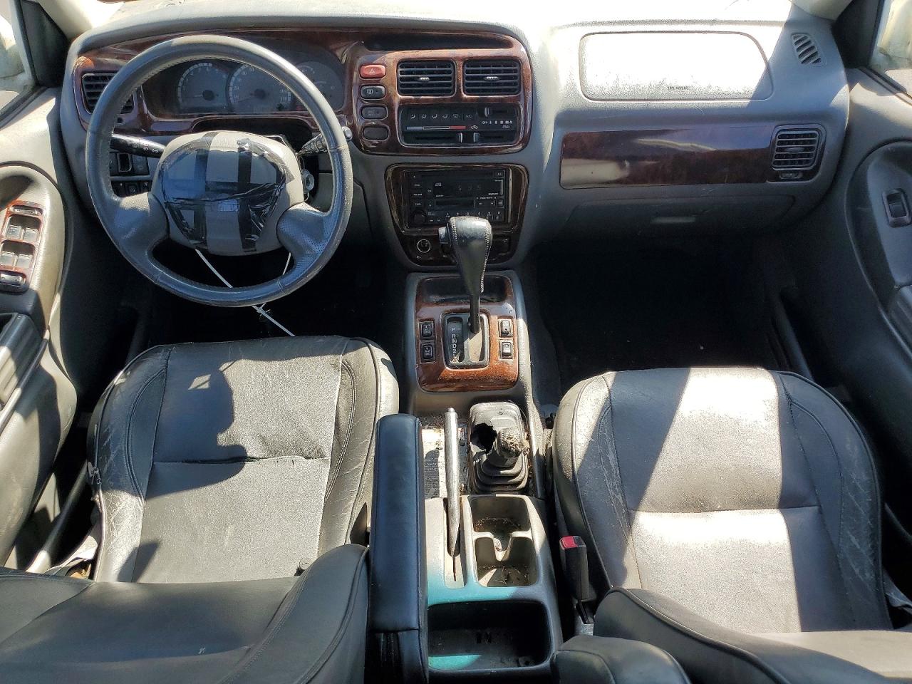 JS3TX92V124128119 · 2002 SUZUKI XL7 · 8/12