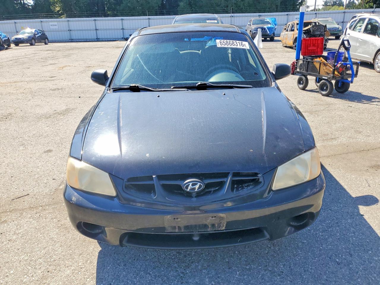 KMHCG35C91U084600 · 2001 HYUNDAI ACCENT · 5/12