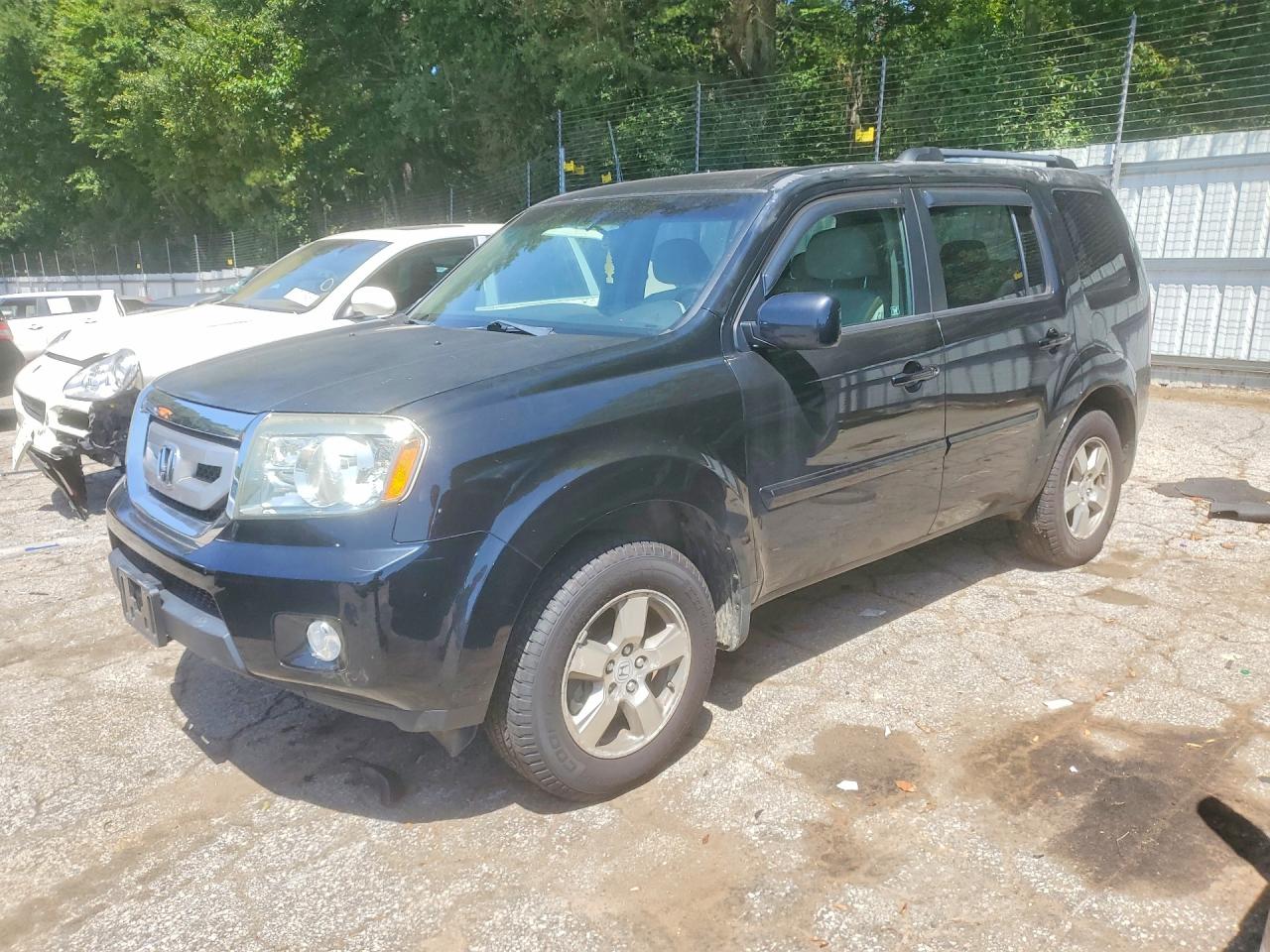 5FNYF4H4XBB028540 · 2011 HONDA PILOT