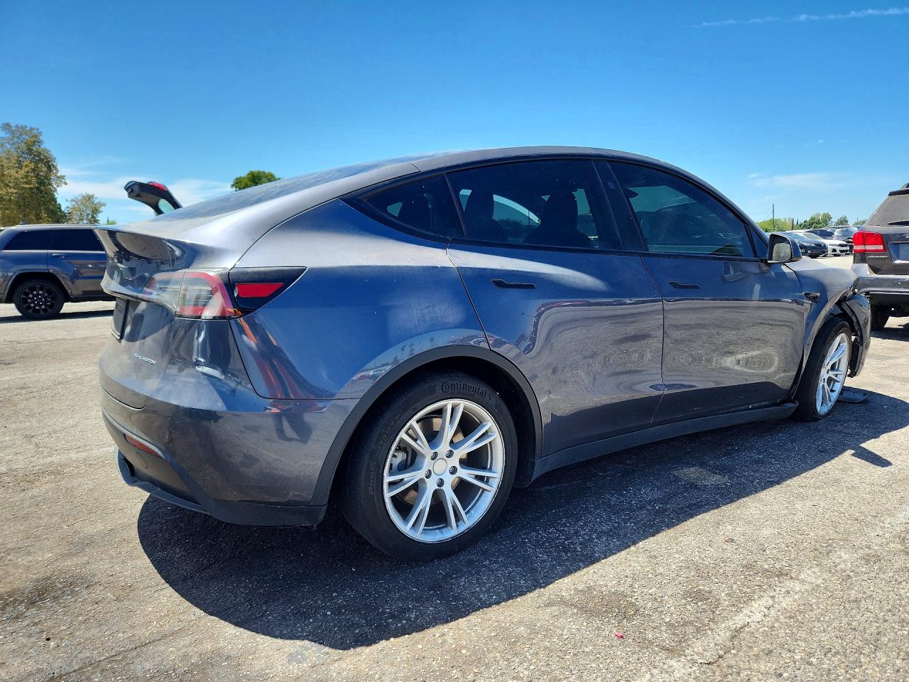 7SAYGDEE1PF890369 · 2023 TESLA MODEL Y · 3/14