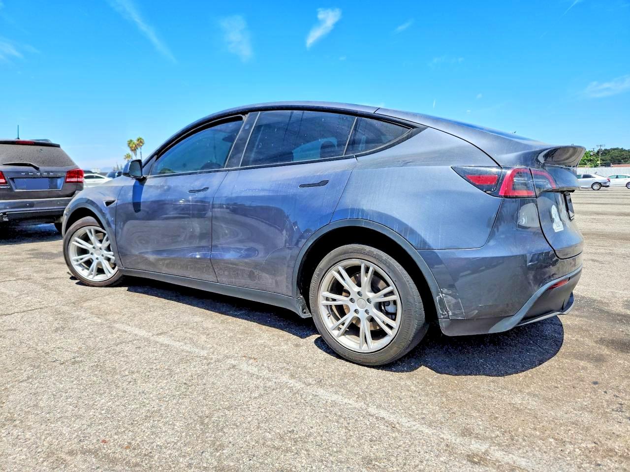 7SAYGDEE1PF890369 · 2023 TESLA MODEL Y · 2/14