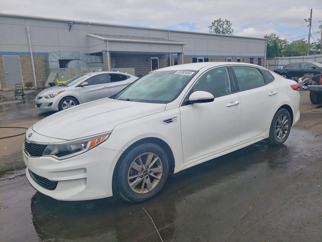 5XXGT4L19JG203146 · 2018 KIA OPTIMA