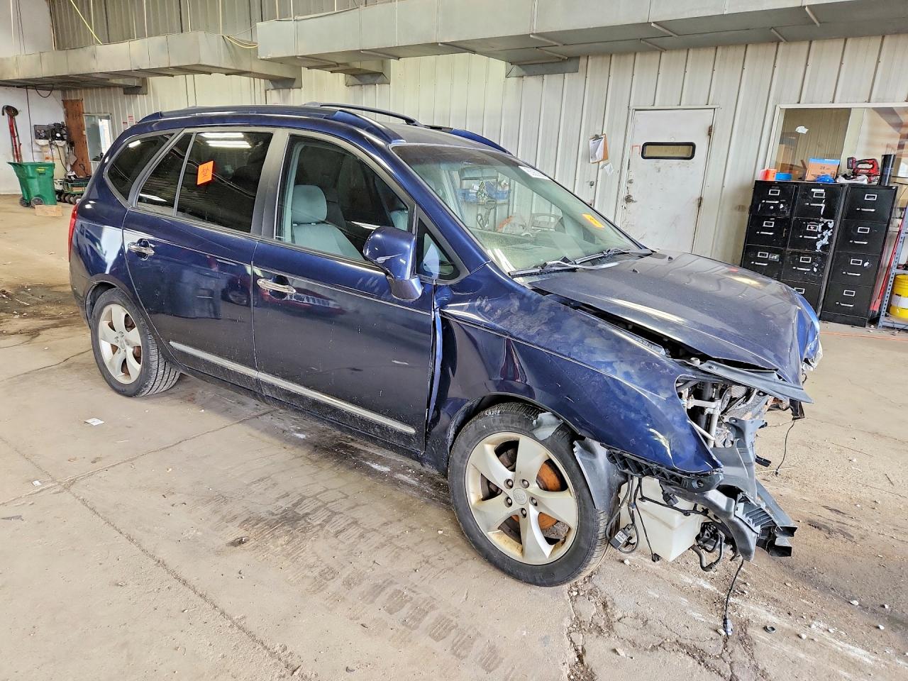 KNAFG526077118598 · 2007 KIA RONDO · 4/12
