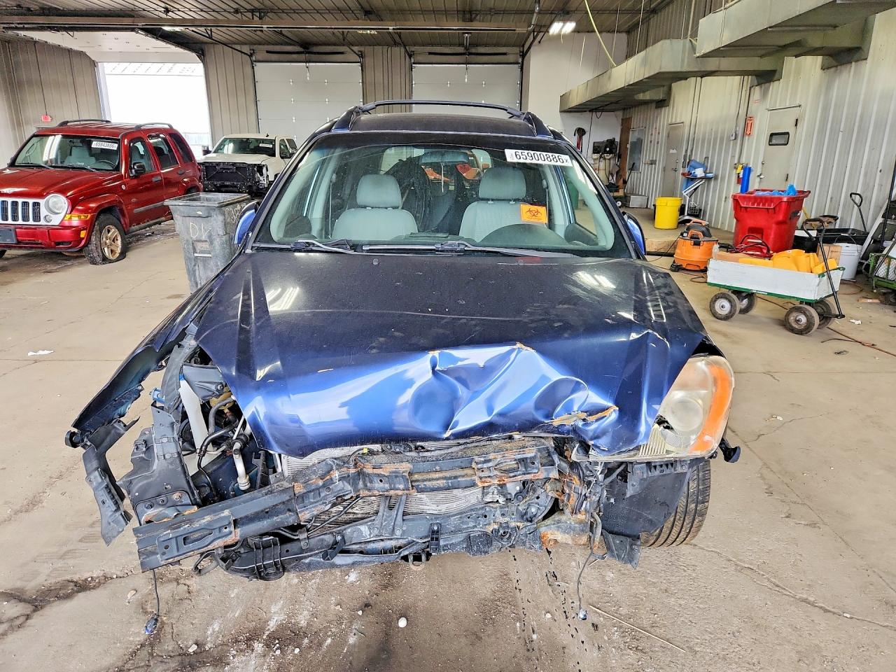 KNAFG526077118598 · 2007 KIA RONDO · 5/12