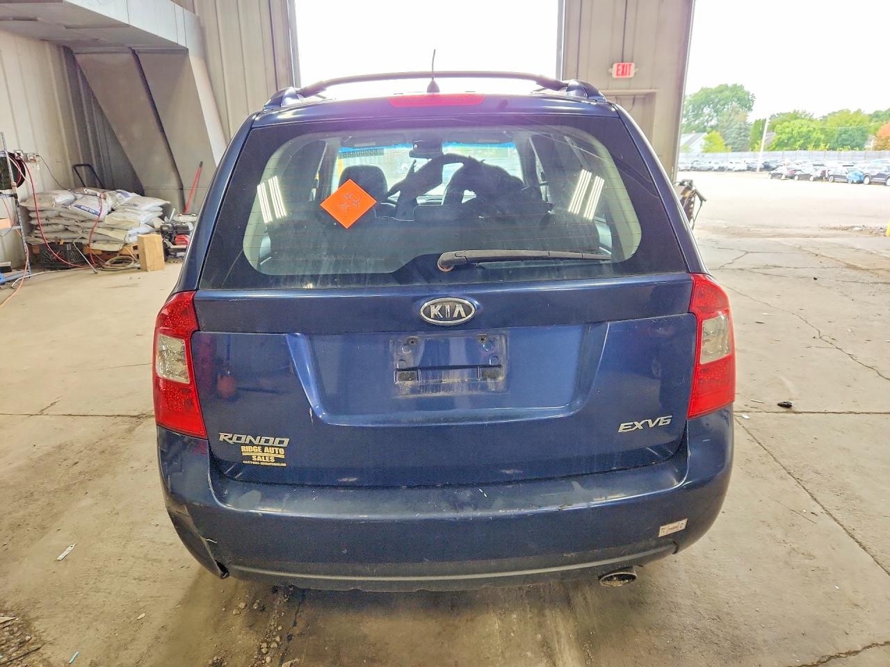 KNAFG526077118598 · 2007 KIA RONDO · 6/12