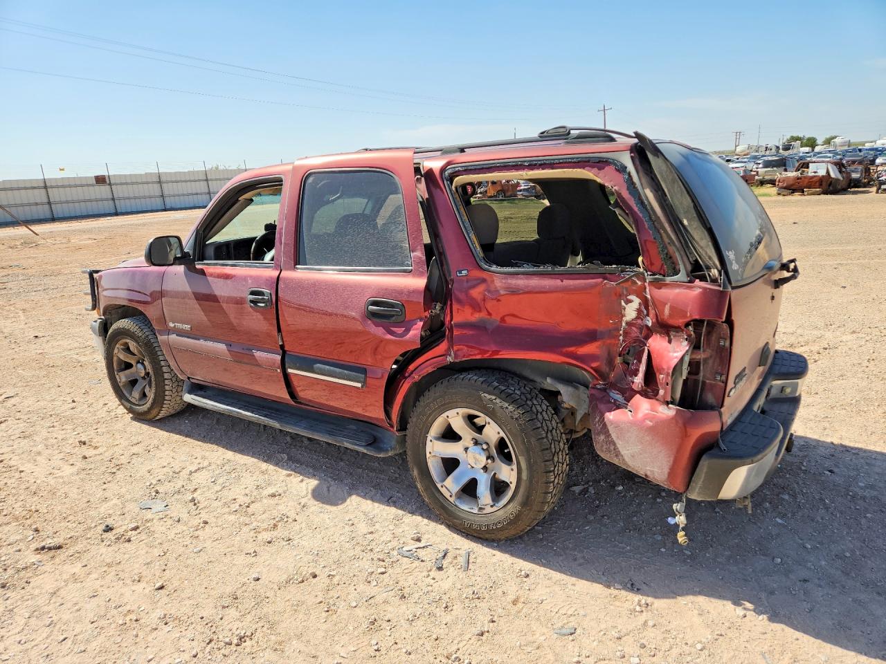 1GNEC13T01R209901 · 2001 CHEVROLET TAHOE · 2/13