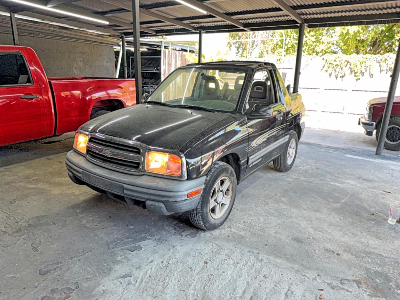 2CNBE18C736925171 · 2003 CHEVROLET TRACKER · 2/12
