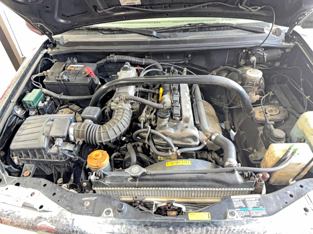 2CNBE18C736925171 · 2003 CHEVROLET TRACKER · 7/12