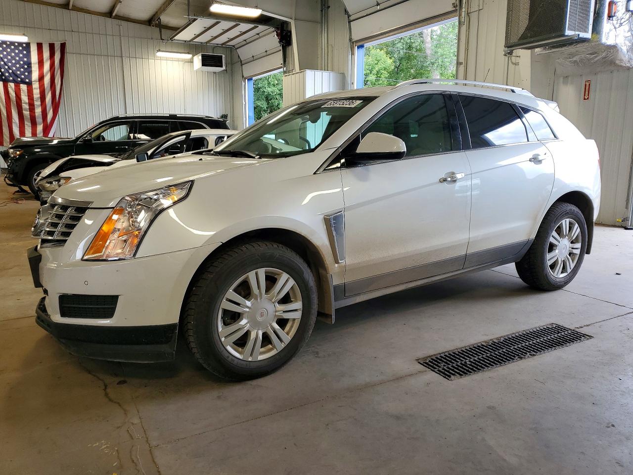 3GYFNBE38FS560127 · 2015 CADILLAC SRX