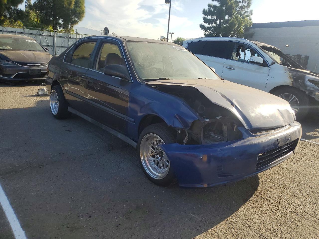 1HGEJ6673YL052406 · 2000 HONDA CIVIC · 4/13