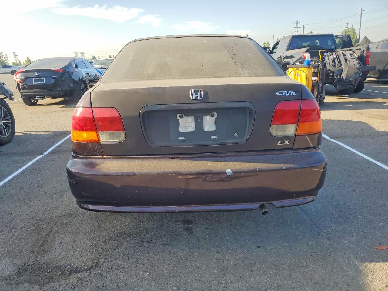 1HGEJ6673YL052406 · 2000 HONDA CIVIC · 6/13