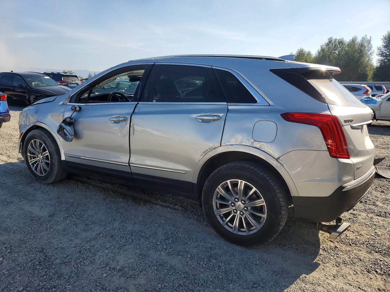1GYKNDRS5HZ220905 · 2017 CADILLAC XT5 · 2/13