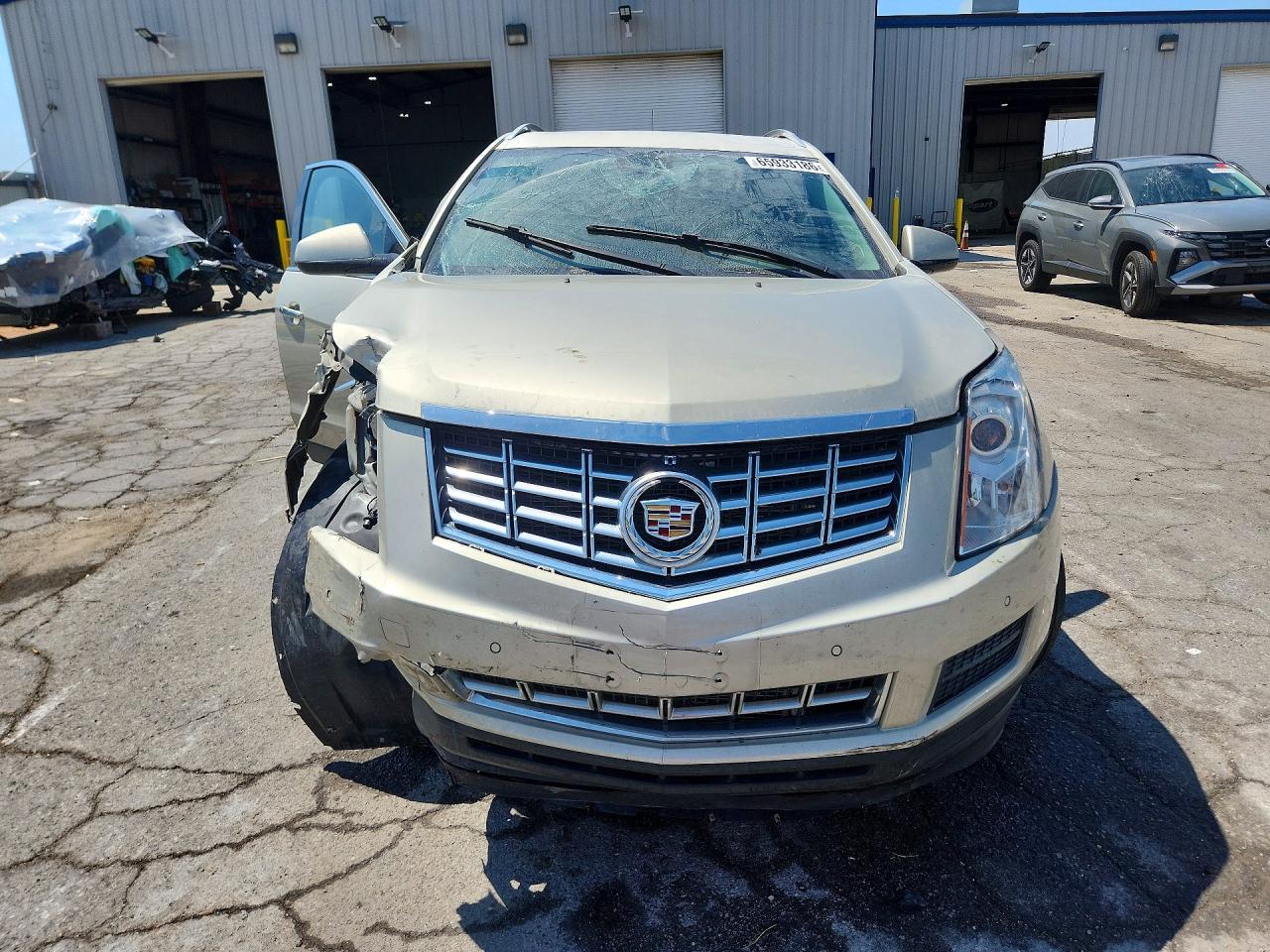 3GYFNBE34ES647604 · 2014 CADILLAC SRX · 5/14