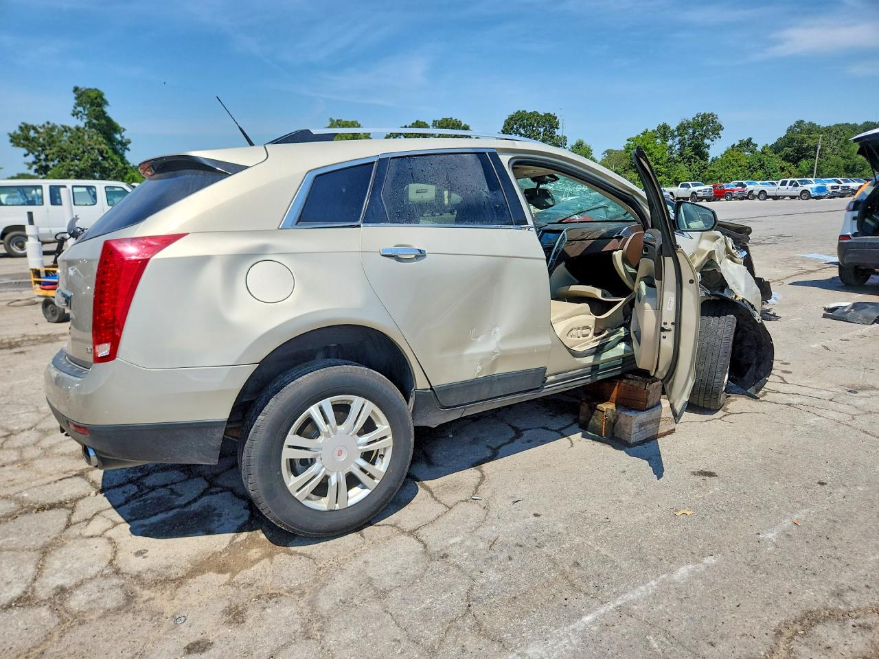 3GYFNBE34ES647604 · 2014 CADILLAC SRX · 3/14