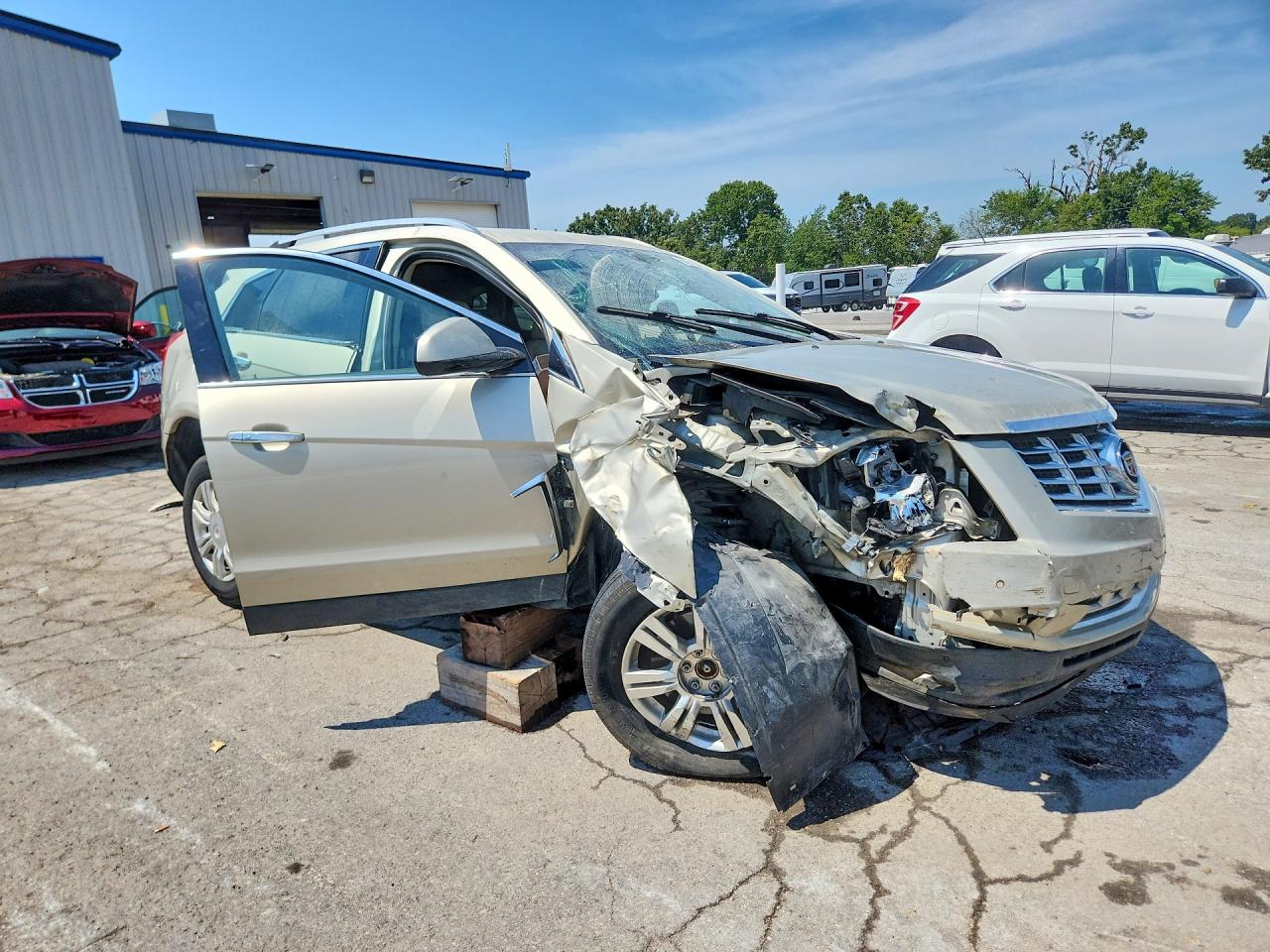3GYFNBE34ES647604 · 2014 CADILLAC SRX · 4/14