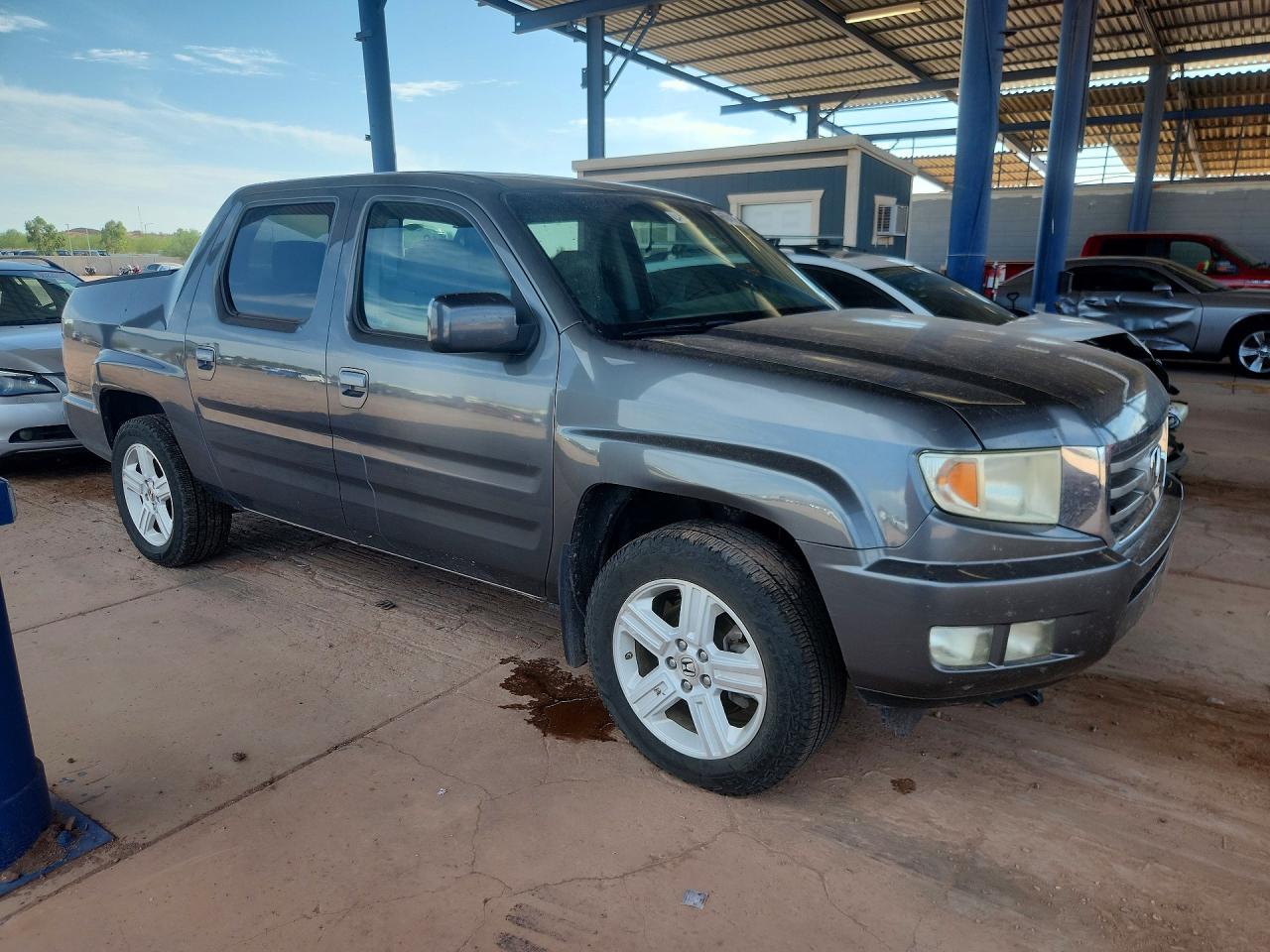 5FPYK1F53CB001579 · 2012 HONDA RIDGELINE · 4/12