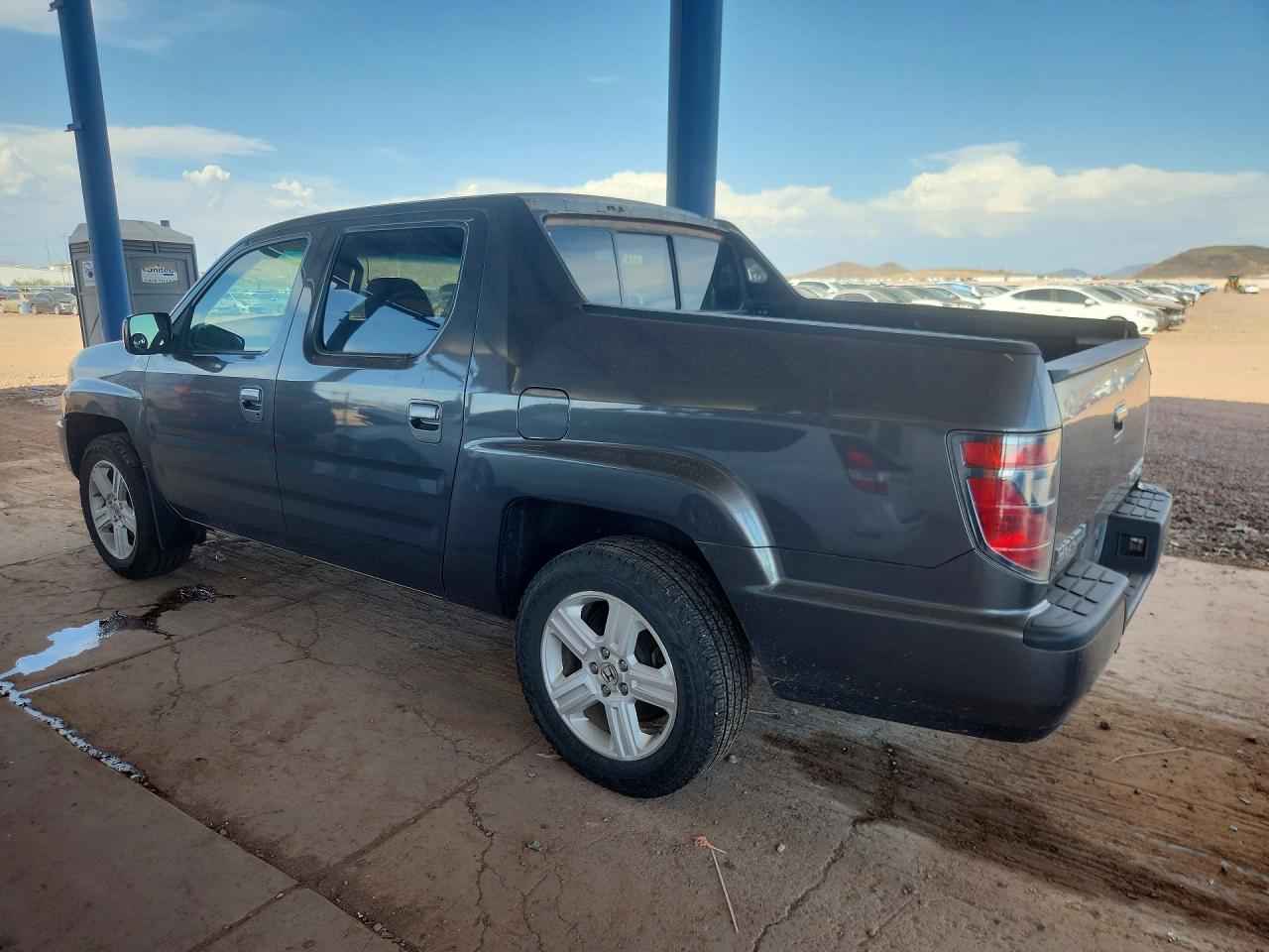 5FPYK1F53CB001579 · 2012 HONDA RIDGELINE · 2/12