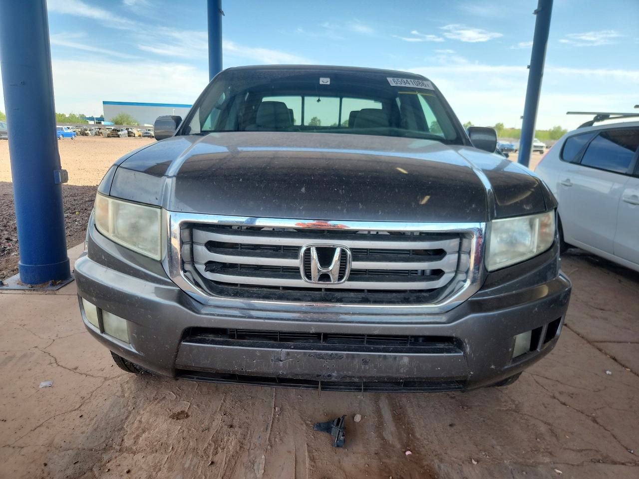 5FPYK1F53CB001579 · 2012 HONDA RIDGELINE · 5/12