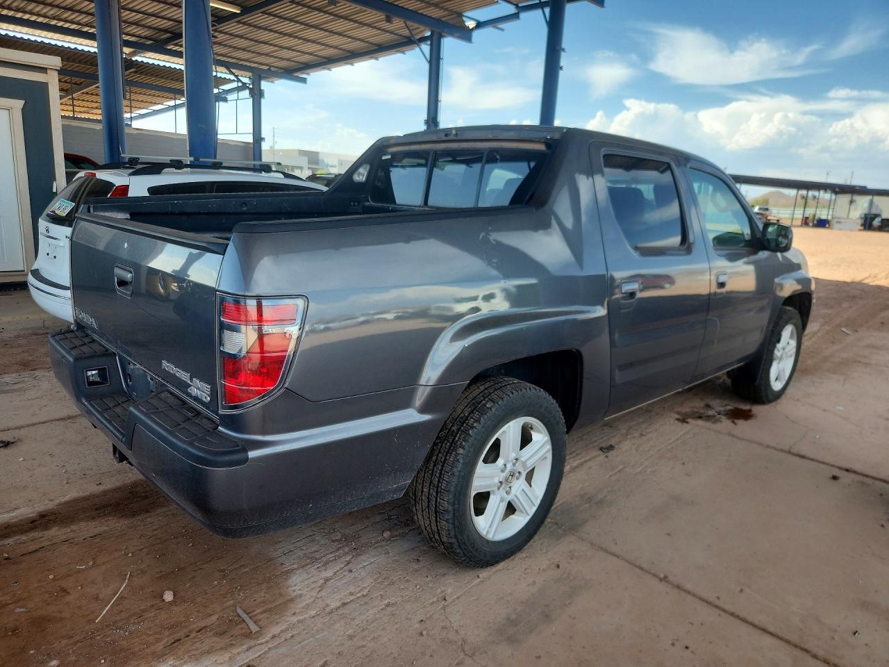 5FPYK1F53CB001579 · 2012 HONDA RIDGELINE · 3/12