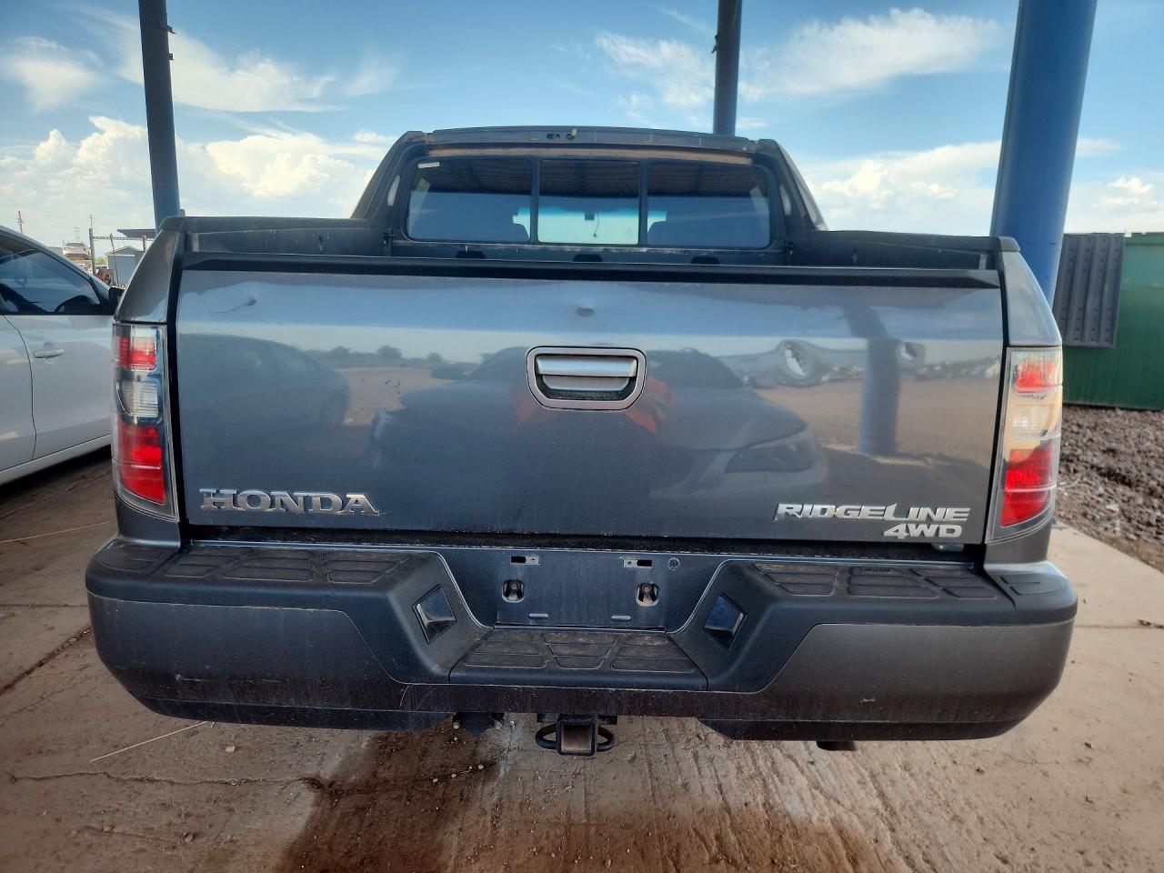 5FPYK1F53CB001579 · 2012 HONDA RIDGELINE · 6/12