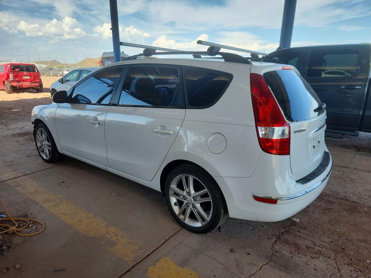 KMHDC8AE6CU128236 · 2012 HYUNDAI ELANTRA TOURING · 2/12